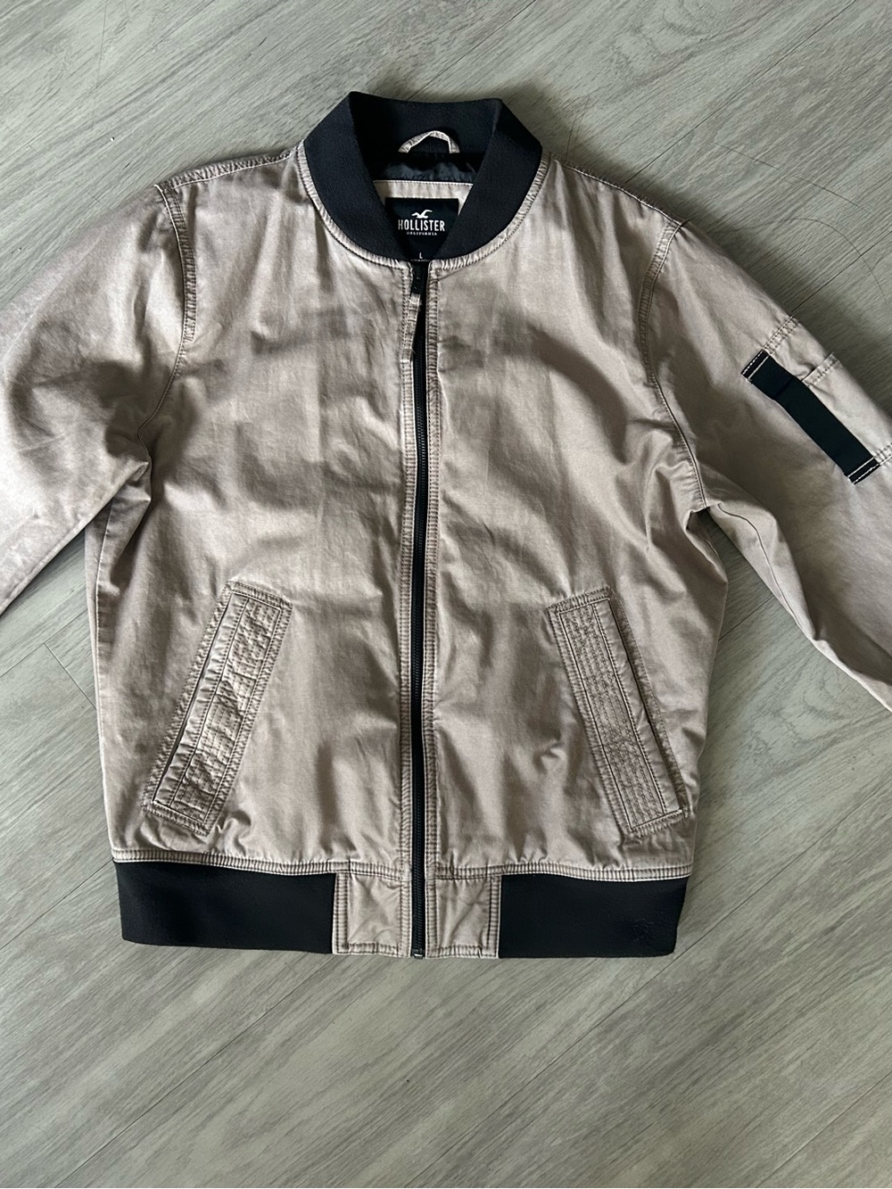 Hollister Men's Light Beige Bomber Jacket with Black Trim